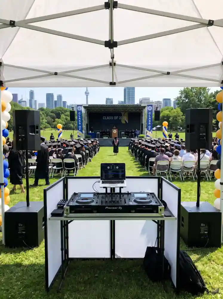 DJ sound station and audio equipment prepared for an outdoor Toronto graduation ceremony